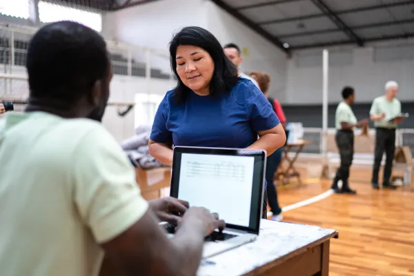 Volunteer gathering information on a computer